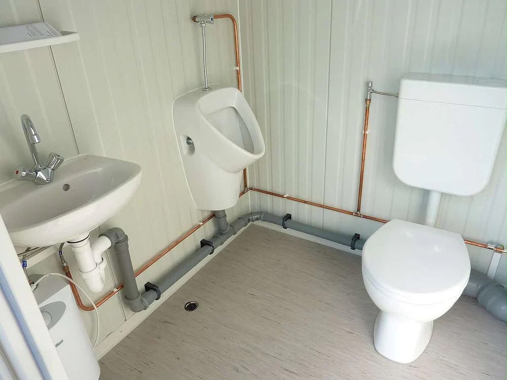 Mini Sanitärcontainer Toilette – kompakte WC-Kabine mit Waschbecken